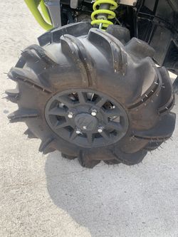 OUTLAW 2’s——-  tires on Polaris wheels (Brand new)