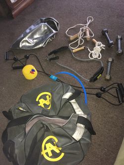Exercise equipment with silver deflated exercise ball asking $35