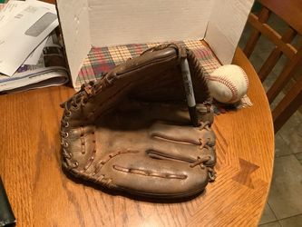 Baseball glove Ted Williams model real leather size 10.5, lots of life left perfect to play catch, backup glove or even to collect.  comes with 2 base
