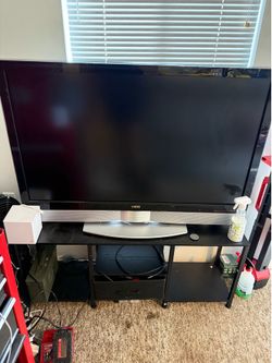 Tv stand with LED light and a Vizio tv 47”