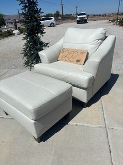 Light Gray Leather Chair and Ottoman Set