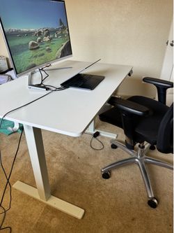 Standing desk and office chair