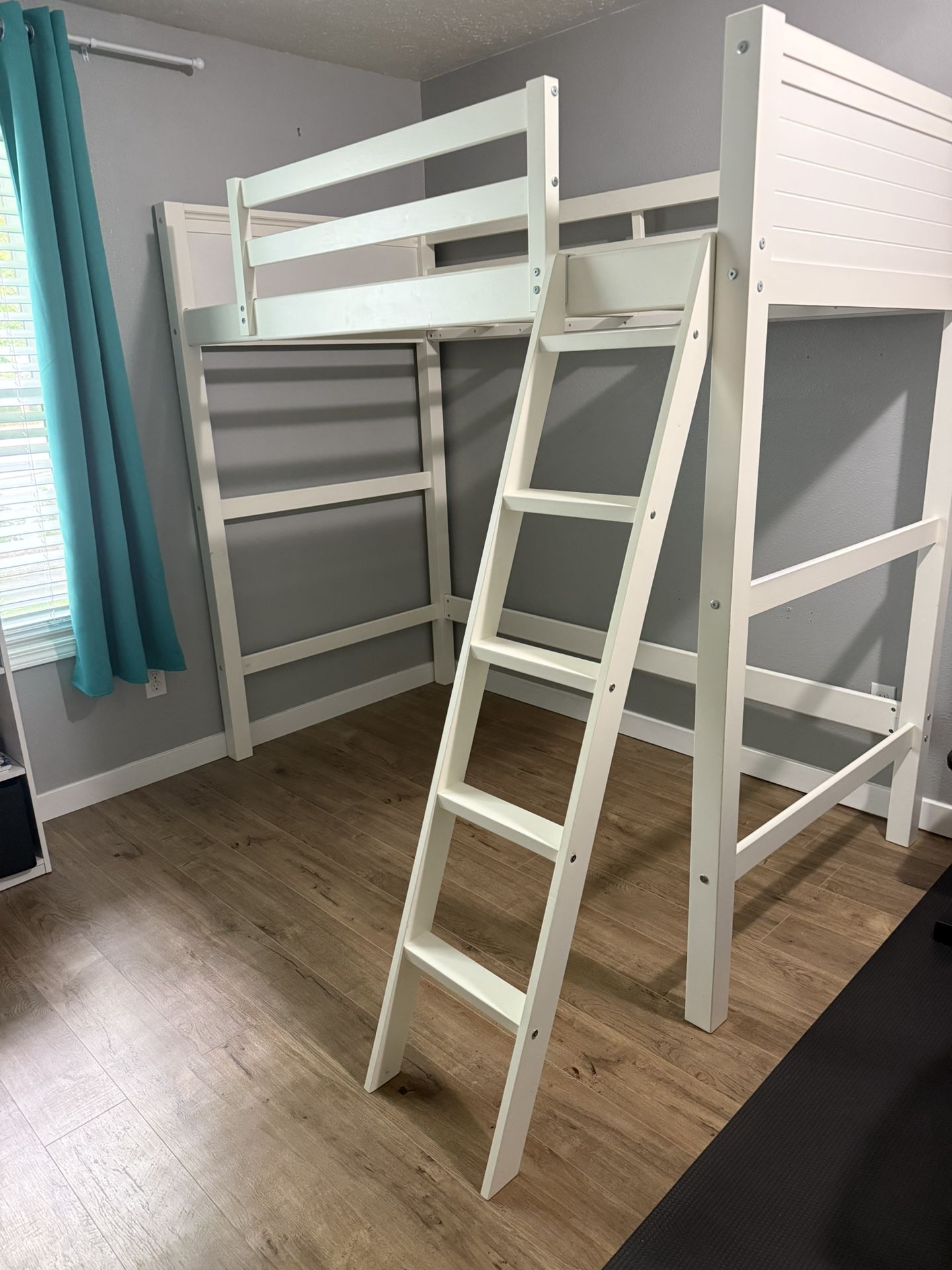 Twin loft bed made of pine