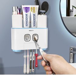 Multifunctional toothbrush holder and toothpaste dispenser 