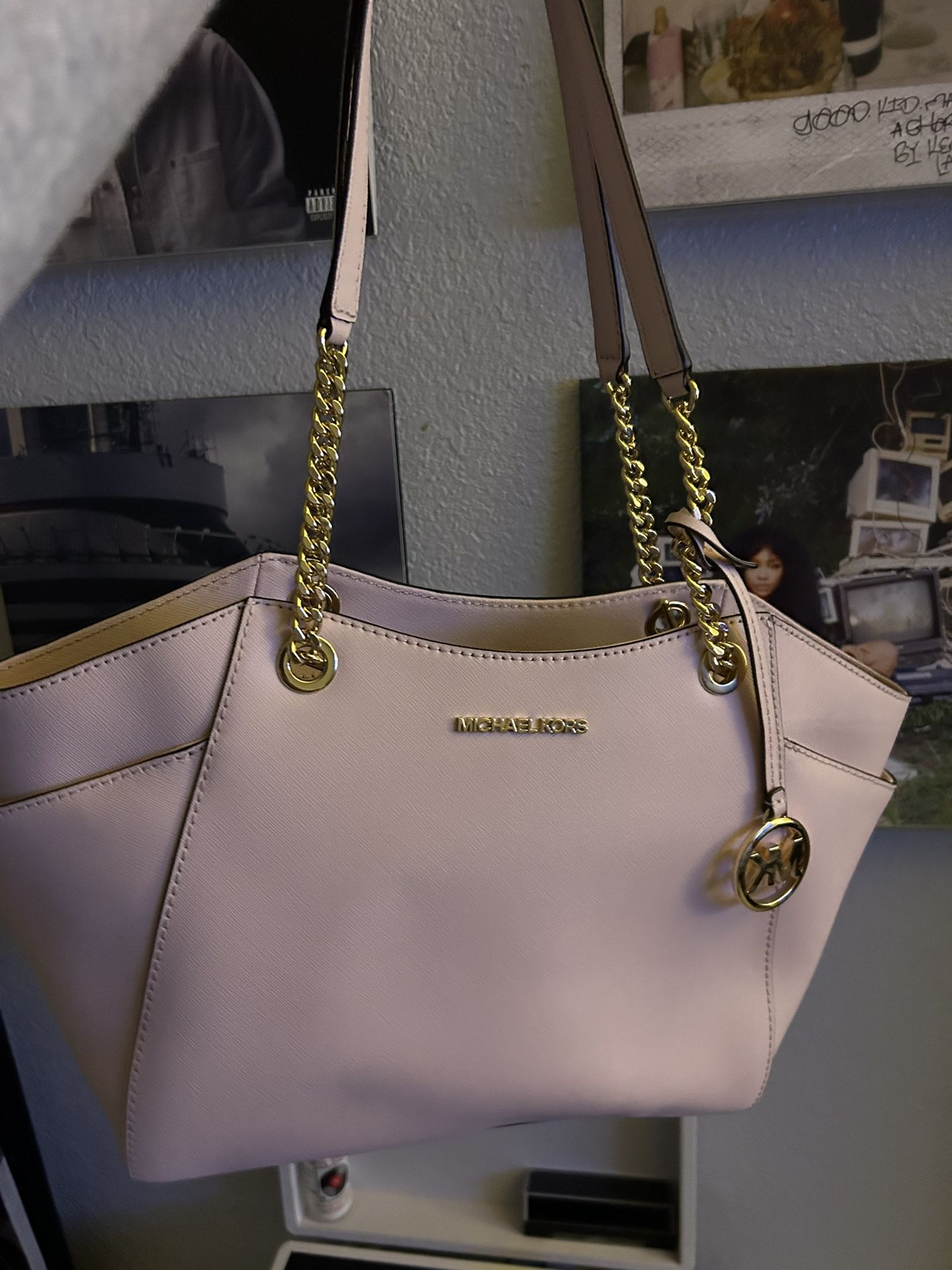 pink michael kors bag with duffle bag