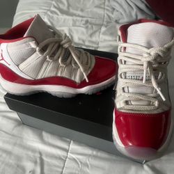 Air Jordan 11s (Red Cherry) 