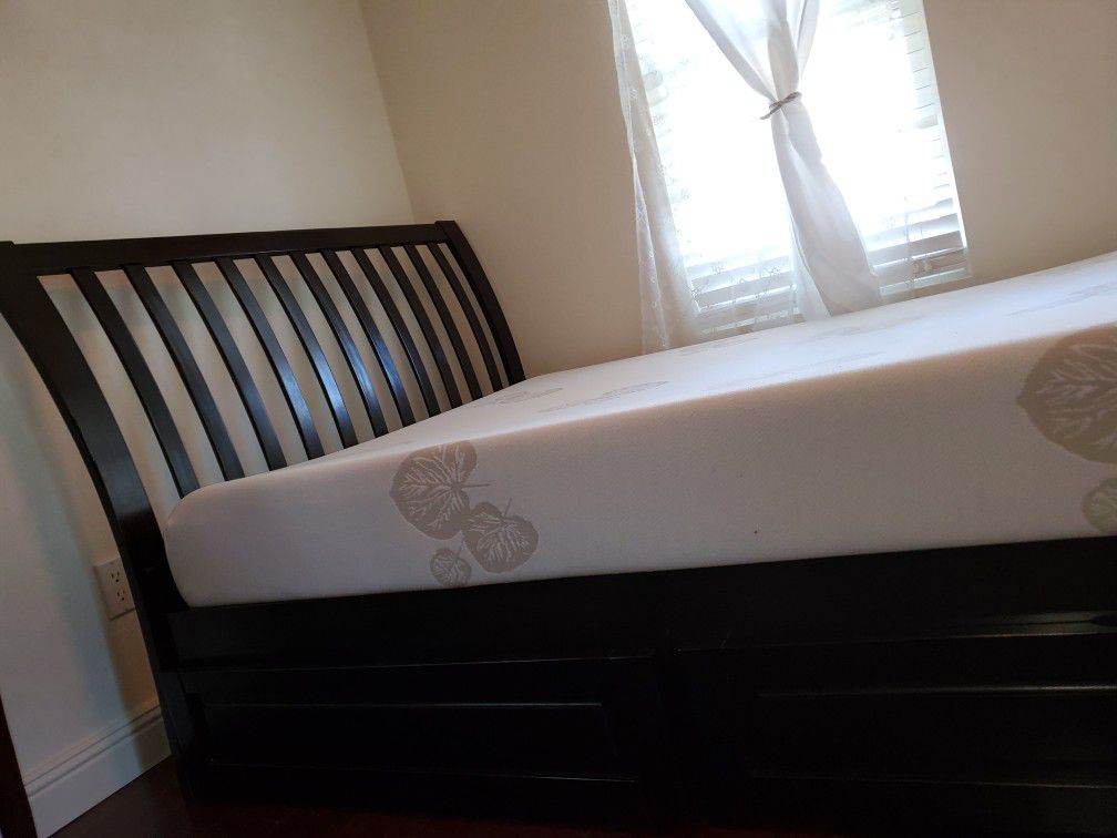 Full size wooden bed frame with 2 storage drawers $700 without mattress, $800 with. OBO