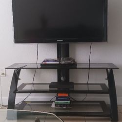 "55 FLATSCREEN /GLASS STAND NO MOUNTING NEEDED. With Remote