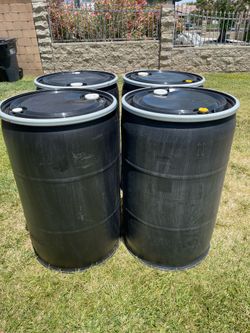 55 black plastic open top with lid $40