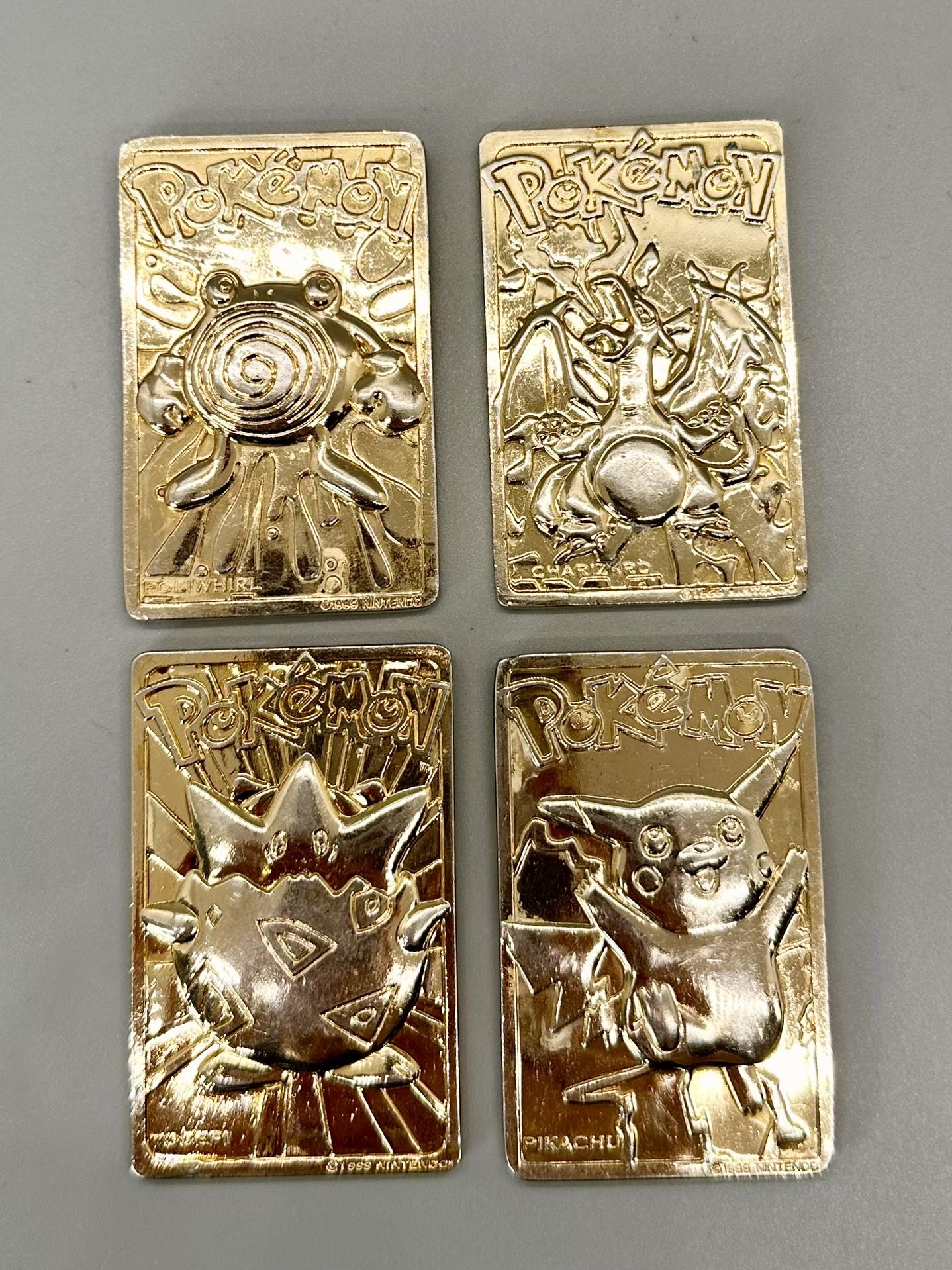 (4) 1999 Pokémon 23K Gold Plated Cards – Burger King - Charizard' Pikachu' Poliwhirl' Togepi 🔥
