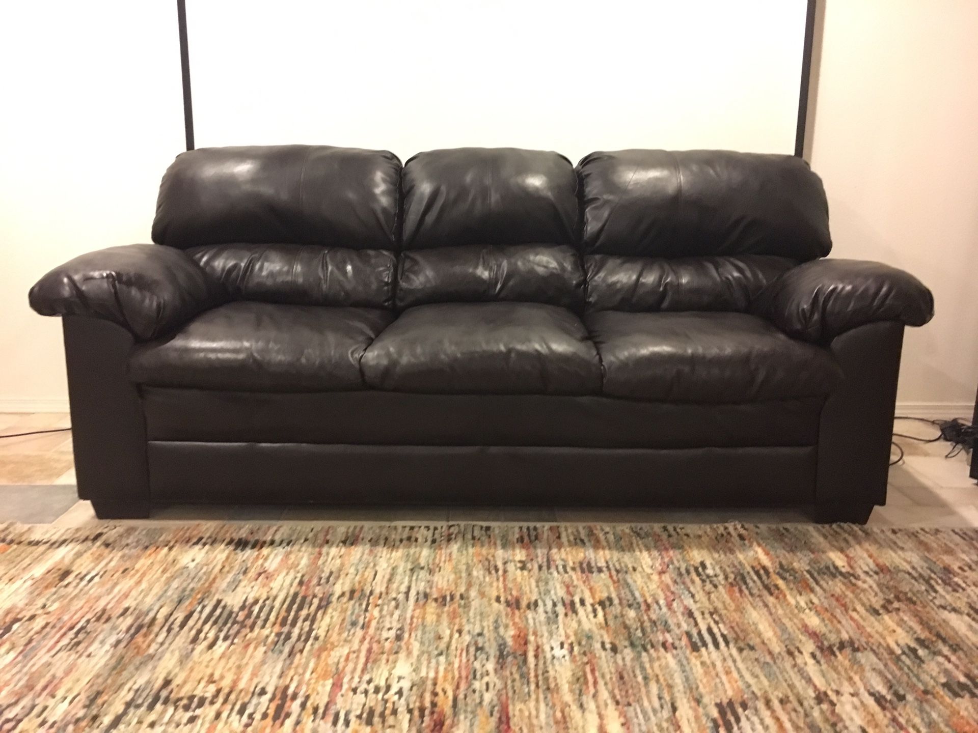 BROWN LEATHER SOFA