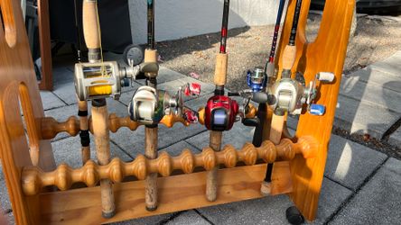 Various baitcaster rods + reels