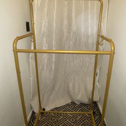 Clothes / Garment Rack in Gold with Wheels & Heavy Duty. Like New & Beautiful! 