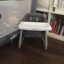 Infantino Booster Chair