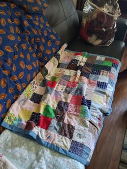 2hand made quilts 2 purchased never used