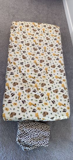 Crib mattress with 2 covers