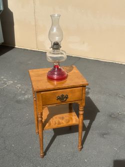Vintage nightstand and oil lamp