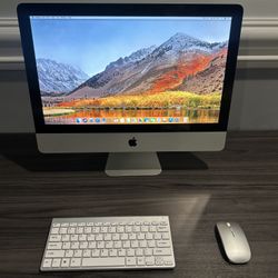 Apple iMac 21.5” with wireless Keyboard/Mouse