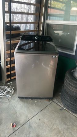 Samsung Top Load Washing Machine and a dryer