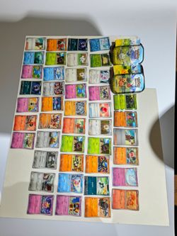 Bulk pokemon cards and 2 tins-see description