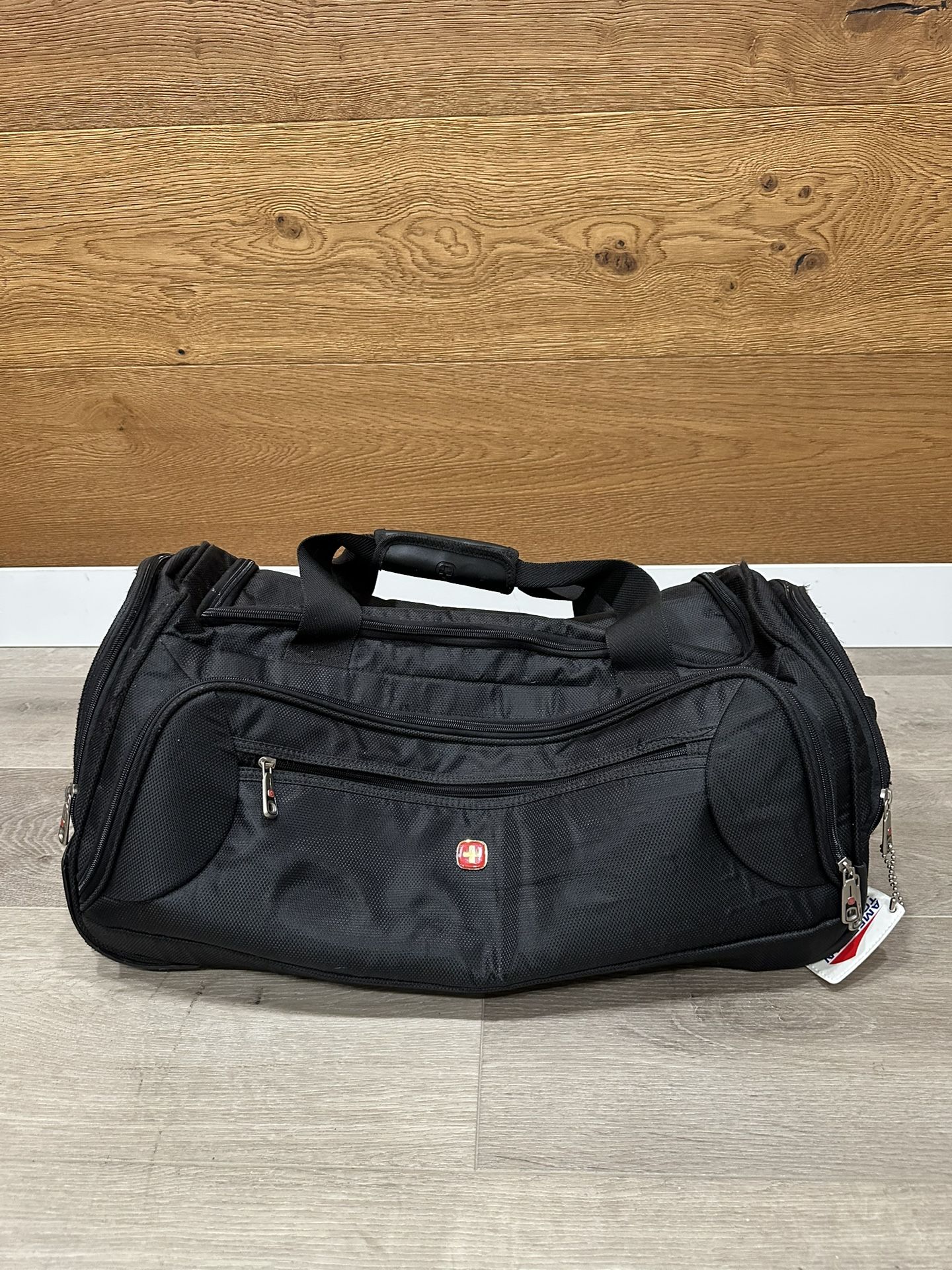 SwissGear by Wenger Rolling Duffle Bag Black Travel Luggage Carry-On with Wheels