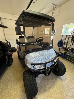 Lifted Club Car 4-Passenger Electric Golf Cart