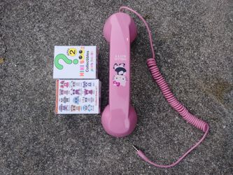Hello Kitty cell phone hand -held adaptor.
