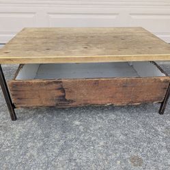 Solid wood top coffee table with vintage fruit crate storage
