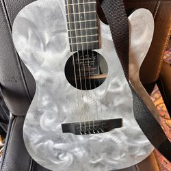 Martin ALternative X - Grand Concert  Guitar , Aluminum Top