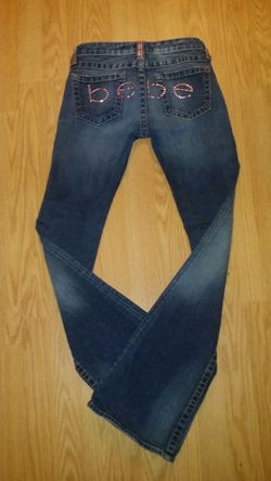 Bebe pink rhinestone designer jeans... Size 25 women boot cut... Great condition