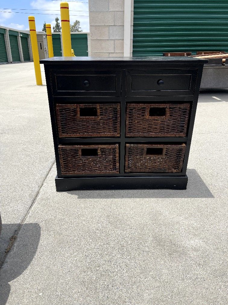 Wood Table With Wicker Storage Bins