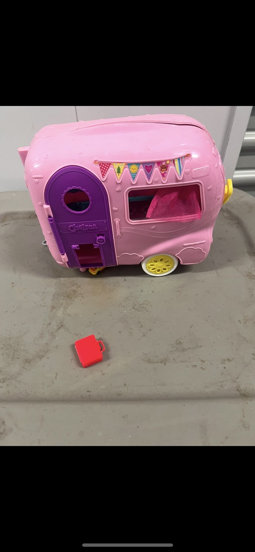 Barbie camper and toy storage shelf