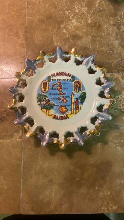 This item is a vintage Hawaii "The 50th State" souvenir decorative plate, likely from the 1960s or 1970s.     