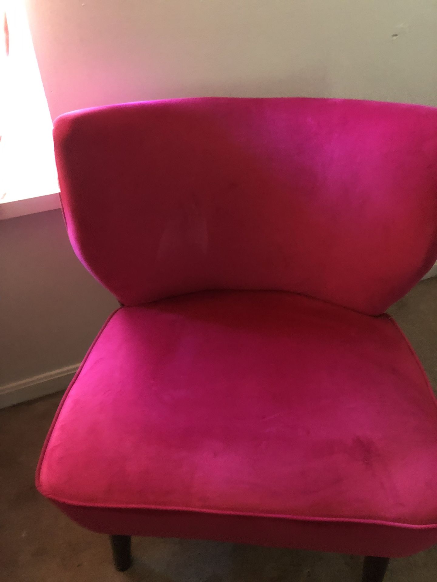 Two pink Chairs.