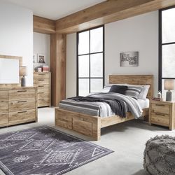  Queen Panel Storage Bed with Mirrored Dresser and Nightstand set by Ashley 