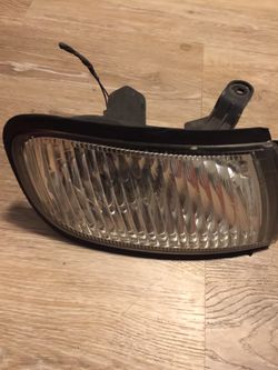 1999 Nissan Maxima side marker headlight lamp front passenger