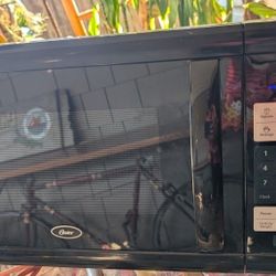 Oster Microwave 1100 Watt Black Oven Works Well Please Read