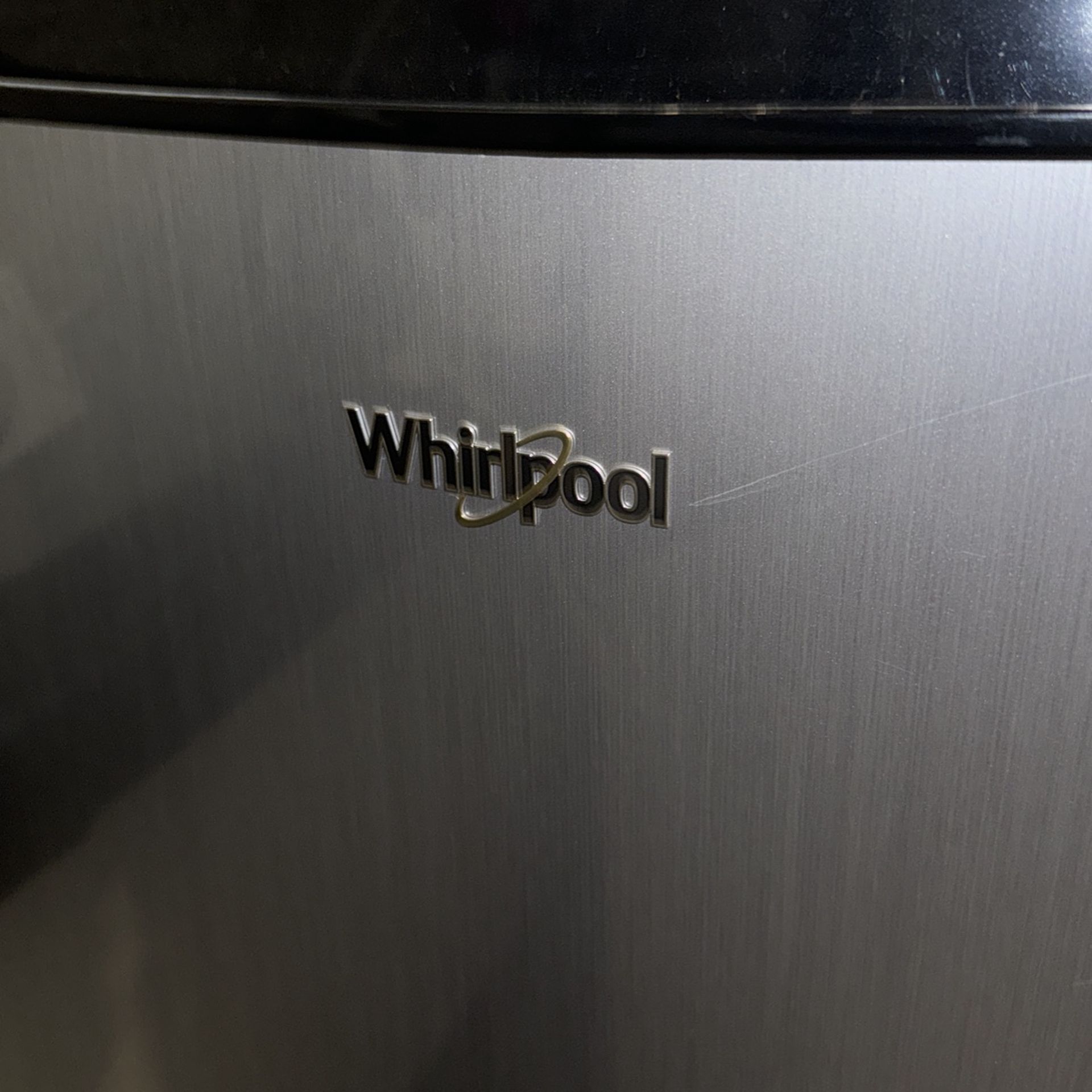 Whirlpool Black and Silver/Stainless Refrigerator