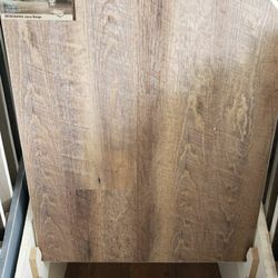 Luxury vinyl planks waterproof floors, click lock, padding attached, sale $1.99 PER SQUARE FOOT