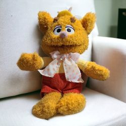 Disney Muppet Babies Fozzie Bear Plush 13" - Pre-ownedLint fuzzies and spot on shirt other than that he is in great condition 