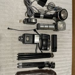 Canon Sure Shot 35mm Camera, Flashes, Tripods And Equipment 