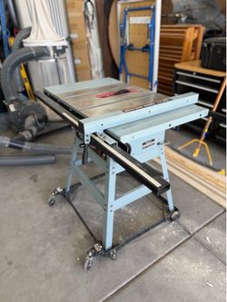 Delta 10” table saw with guide and rolling base