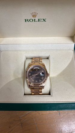 Rolex day date rose gold