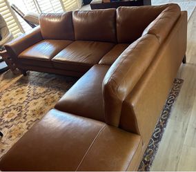 L-shaped leather couch in excellent condition!