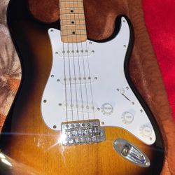 Sun-burst Fender Squier 