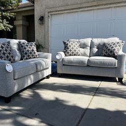 Brand New. (Set of 2) Lane Love Seat Sofa’s. Tweed color with accent pillows.  $649
