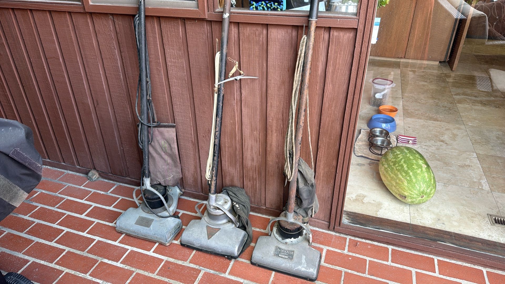 Antique Hoover Vacuum Cleaners.