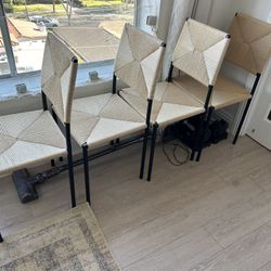 Four Rattan Dining Chairs