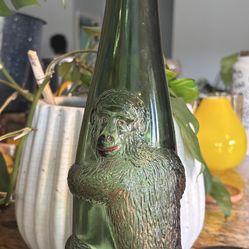 German Embossed Monkey Wine Bottle