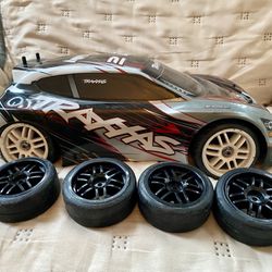 Traxxas Rally Car 4WD 1/16 Extra Wheels And Batteries